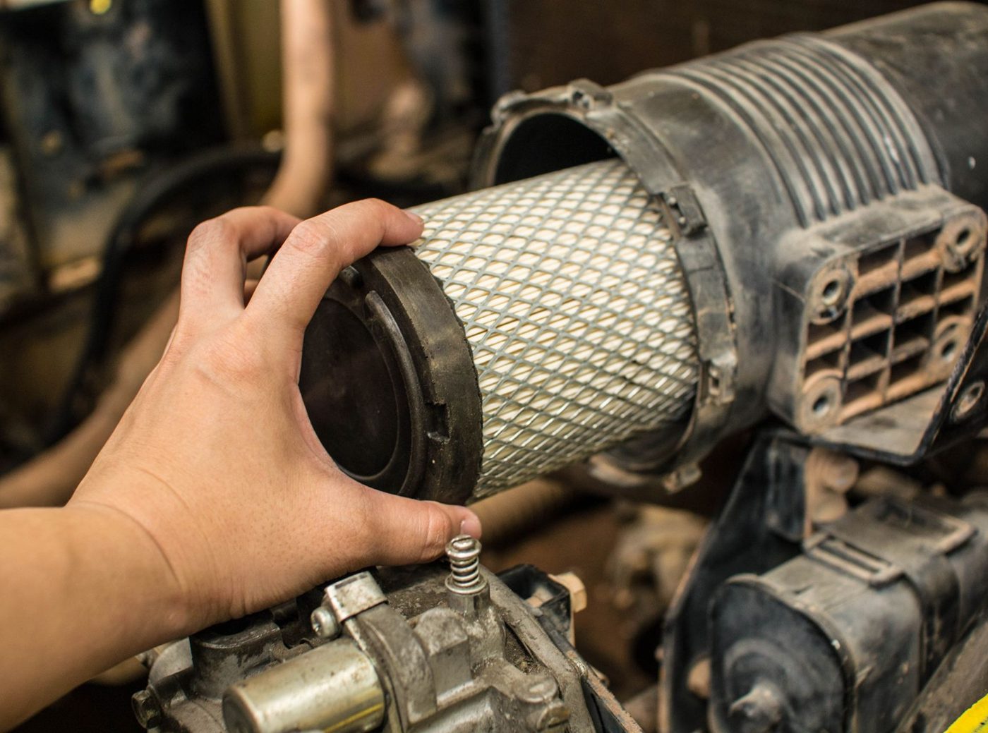Forklift air filter being serviced